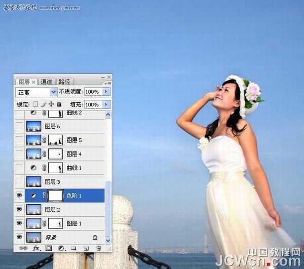 Photoshop调出海景人物图片纯美的蓝色调