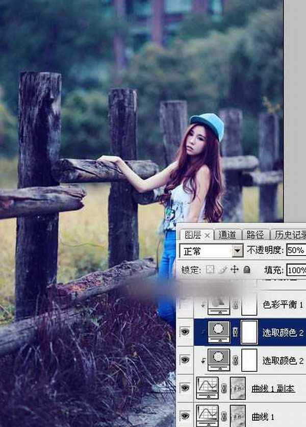 Photoshop为木桩边的美女人物加上高对比蓝黄色效果教程